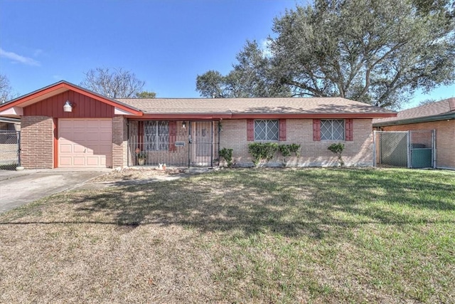 ranch-style house featuring a front lawn, an attached garage, fence, and brick siding