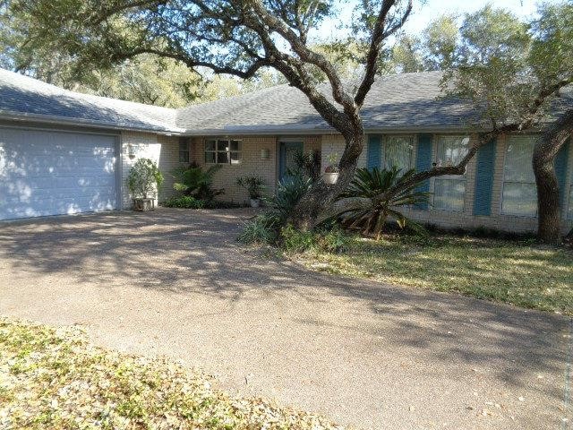 ranch-style house featuring a garage