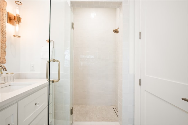 full bathroom featuring vanity and a stall shower