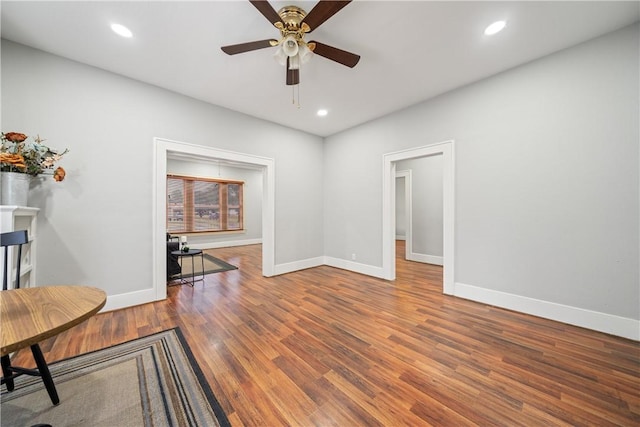 interior space featuring hardwood / wood-style floors and ceiling fan