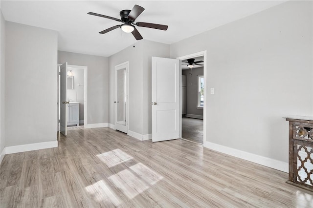 unfurnished bedroom featuring ceiling fan and light hardwood / wood-style floors