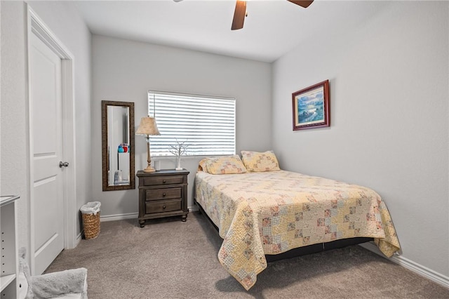 bedroom with carpet floors, ceiling fan, and baseboards