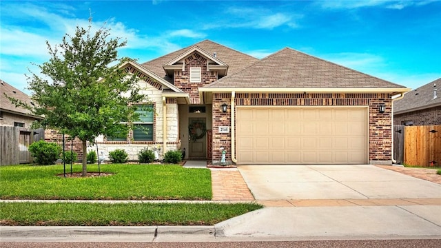 view of front of property with a front lawn, fence, brick siding, an attached garage, and driveway
