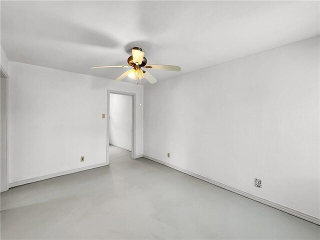 1245 Florida Ave, Corpus Christi, TX 78404 - spare room with baseboards, ceiling fan, and concrete flooring