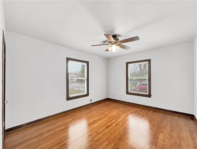 1245 Florida Ave, Corpus Christi, TX 78404 - empty room featuring baseboards, light wood-type flooring, and a ceiling fan