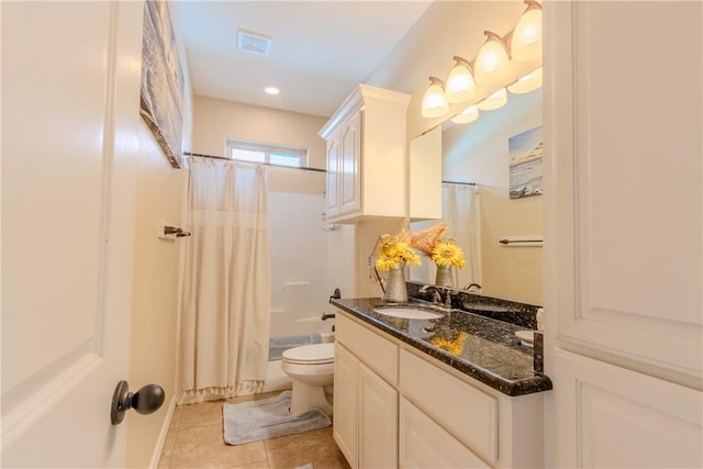 full bathroom with tile patterned flooring, shower / bath combination with curtain, toilet, and vanity