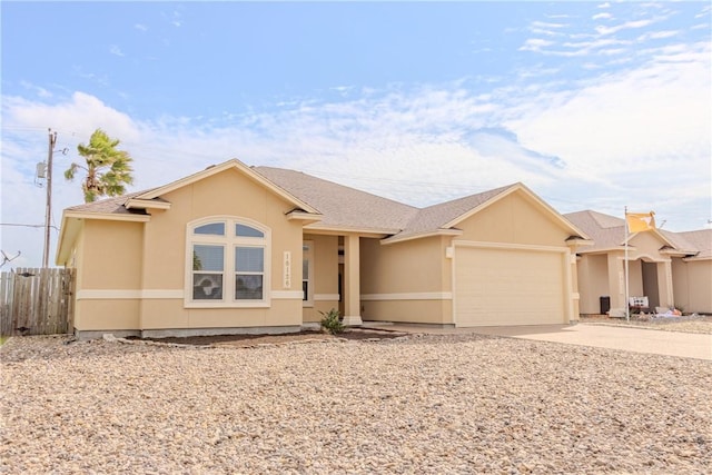 ranch-style home with a garage