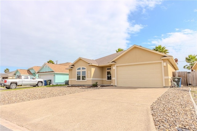 ranch-style house featuring a garage