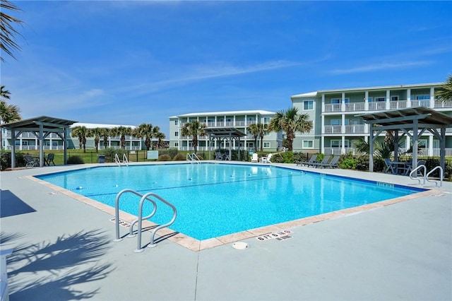 1107 E 11th St Unit H58, Port Aransas, TX 78373 - community pool with fence and a patio