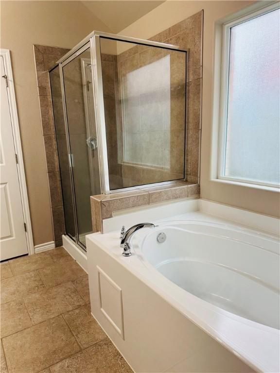 7209 Lands End Dr, Corpus Christi, TX 78414 - bathroom featuring a garden tub and a shower stall