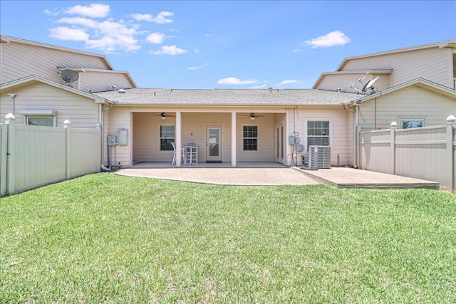 back of house featuring a fenced backyard, cooling unit, a ceiling fan, and a patio