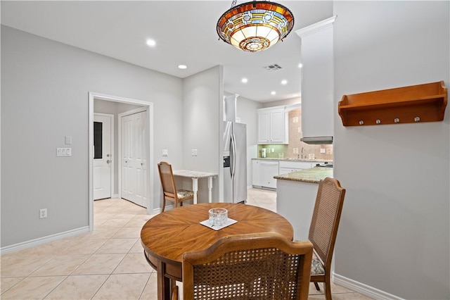 dining area with recessed lighting, visible vents, baseboards, and light tile patterned flooring