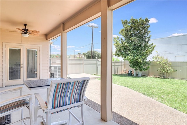 view of patio / terrace with a ceiling fan and a fenced backyard