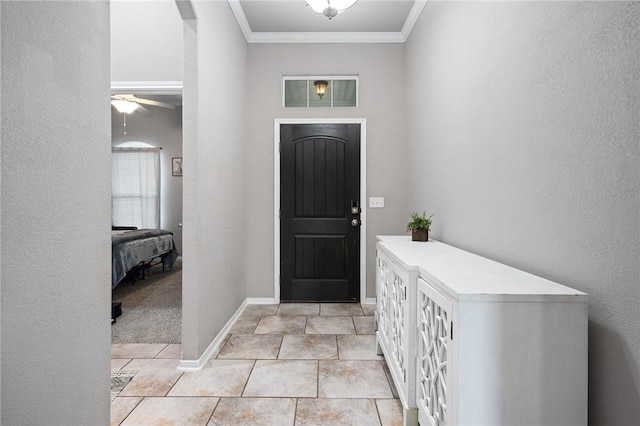 1116 Santa Catalina St, Portland, TX 78374 - foyer featuring baseboards, a textured wall, crown molding, light tile patterned flooring, and ceiling fan