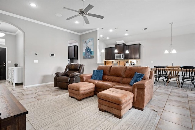 1116 Santa Catalina St, Portland, TX 78374 - living area with arched walkways, light tile patterned floors, visible vents, and a ceiling fan