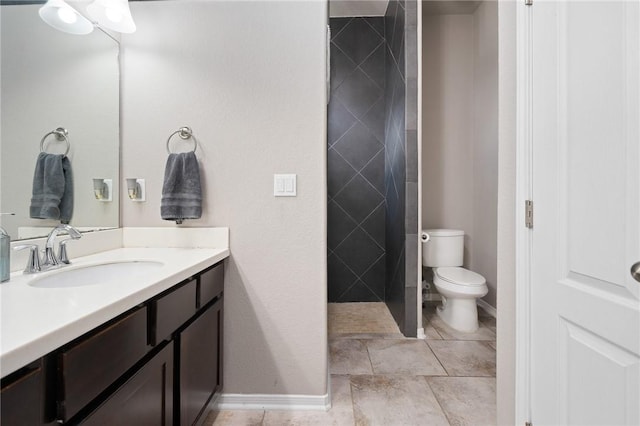 1116 Santa Catalina St, Portland, TX 78374 - bathroom featuring tile patterned floors, toilet, vanity, and baseboards