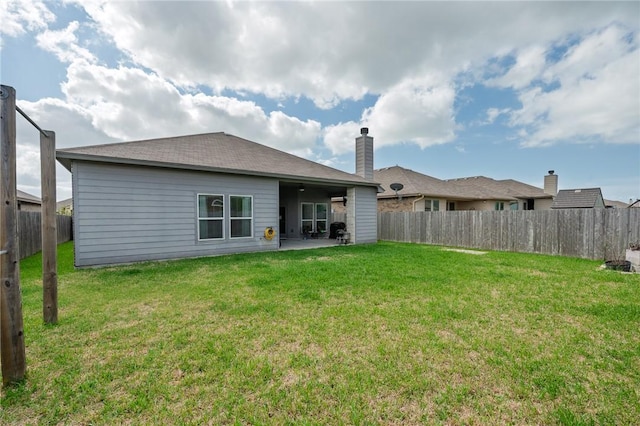 1116 Santa Catalina St, Portland, TX 78374 - rear view of property featuring a patio, a fenced backyard, a chimney, and a lawn