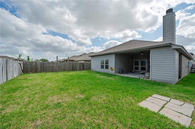 1116 Santa Catalina St, Portland, TX 78374 - back of property with a yard, a fenced backyard, and a patio area