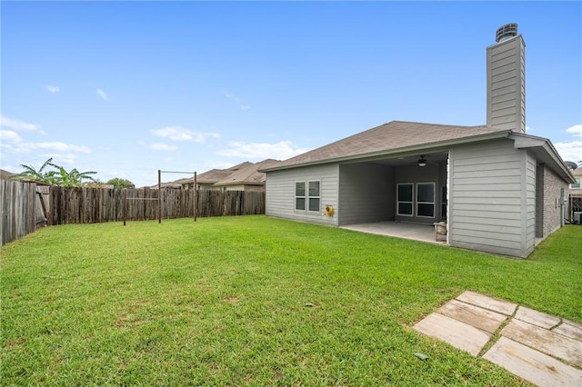 1116 Santa Catalina St, Portland, TX 78374 - back of house featuring a patio, a fenced backyard, a chimney, and a ceiling fan