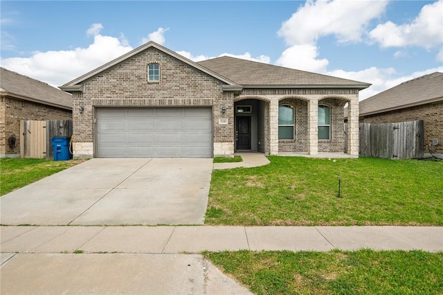 1116 Santa Catalina St, Portland, TX 78374 - view of front facade with a front yard, fence, and brick siding