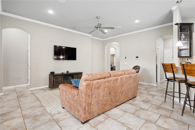 1116 Santa Catalina St, Portland, TX 78374 - living area featuring visible vents, light tile patterned floors, arched walkways, ornamental molding, and ceiling fan