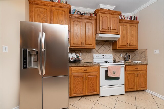 kitchen with stainless steel fridge, decorative backsplash, light tile patterned floors, crown molding, and white range with electric stovetop