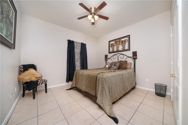 tiled bedroom with ceiling fan