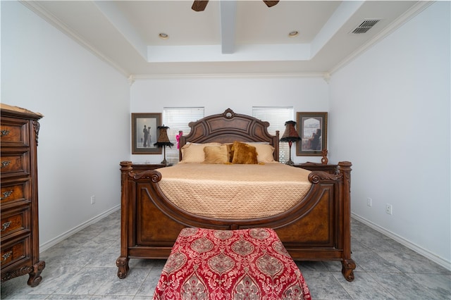 bedroom featuring ornamental molding, ceiling fan, a tray ceiling, and light tile patterned floors