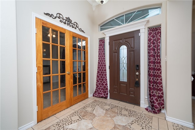 entryway featuring light tile patterned floors