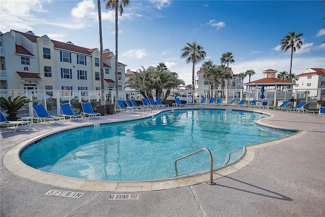 view of swimming pool with a gazebo and a patio