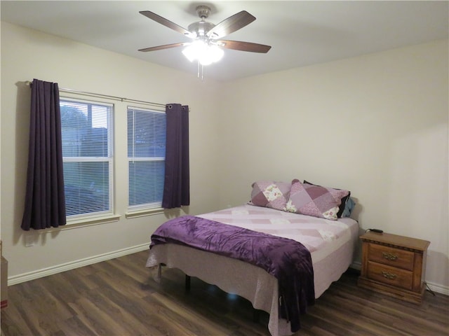 bedroom featuring dark wood-type flooring and ceiling fan