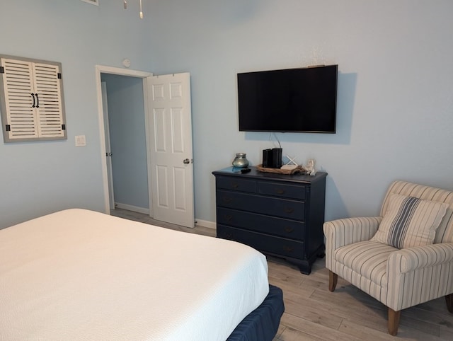 bedroom featuring light wood-type flooring