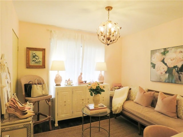 sitting room with an inviting chandelier