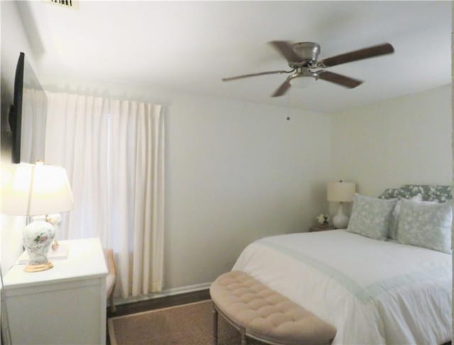 bedroom featuring ceiling fan