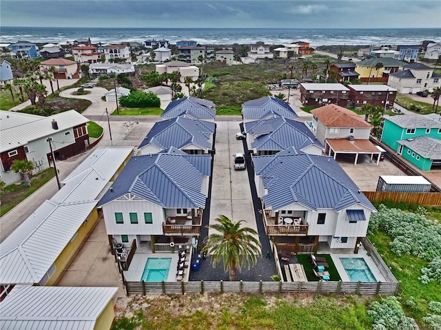 aerial view of residential area with a pool