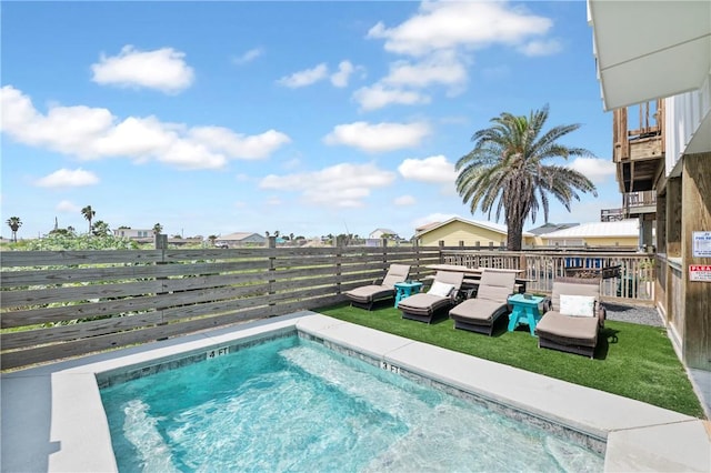 view of swimming pool featuring a fenced backyard and a swimming pool