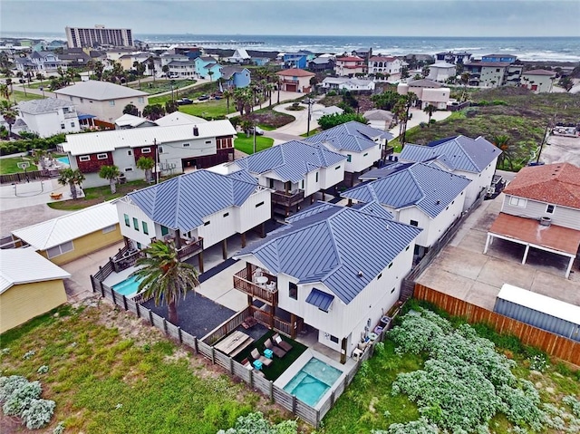 aerial view of residential area with a pool