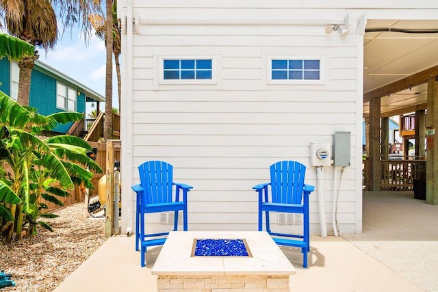 650 Dolphin Prt, Aransas, TX 78373 - view of patio / terrace featuring an outdoor fire pit