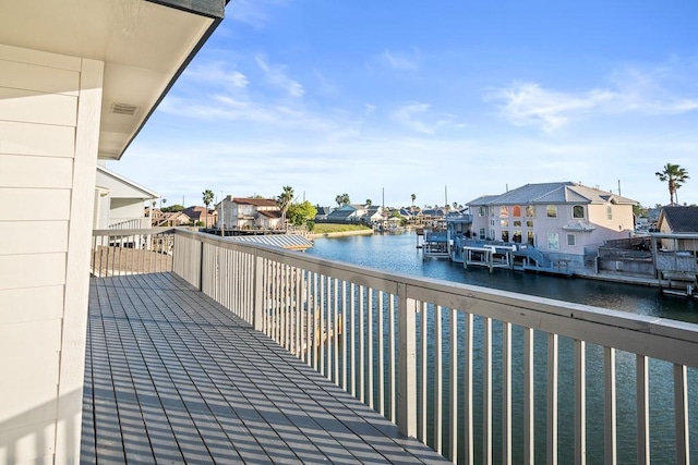 exterior space featuring a water view and a residential view