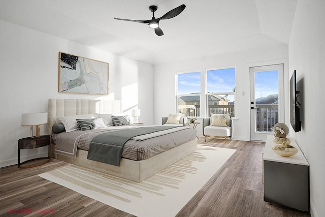 bedroom with access to outside, wood finished floors, and ceiling fan