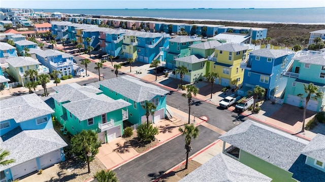 birds eye view of property with a residential view and a water view