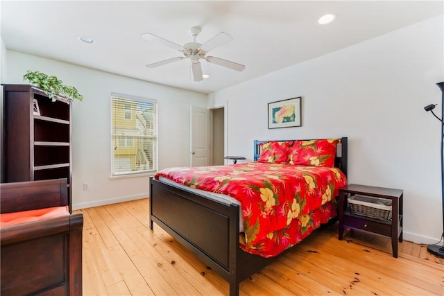 bedroom featuring recessed lighting, light wood-type flooring, and baseboards