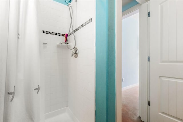 bathroom featuring a shower stall