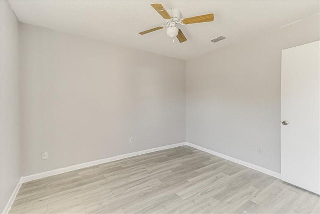 6701 Meadowbreeze Pkwy, Corpus Christi, TX 78414 - empty room with light wood finished floors, baseboards, and ceiling fan