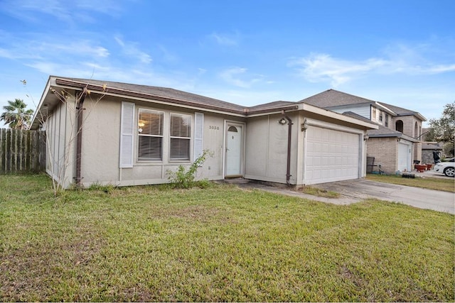 single story home with a garage and a front yard