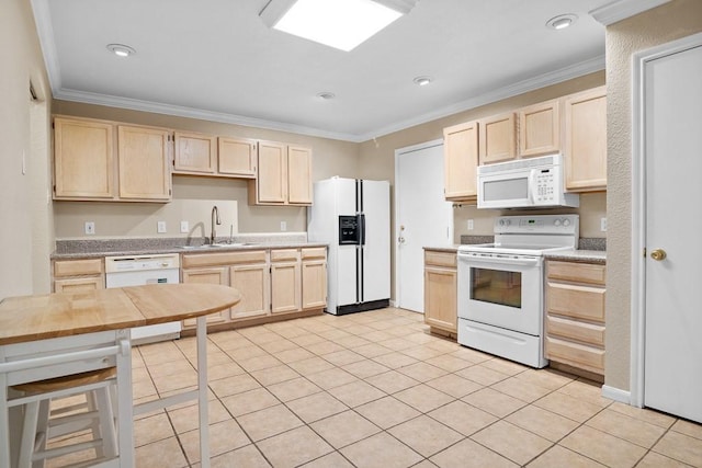 kitchen with sink, white appliances, light tile patterned flooring, light brown cabinets, and ornamental molding