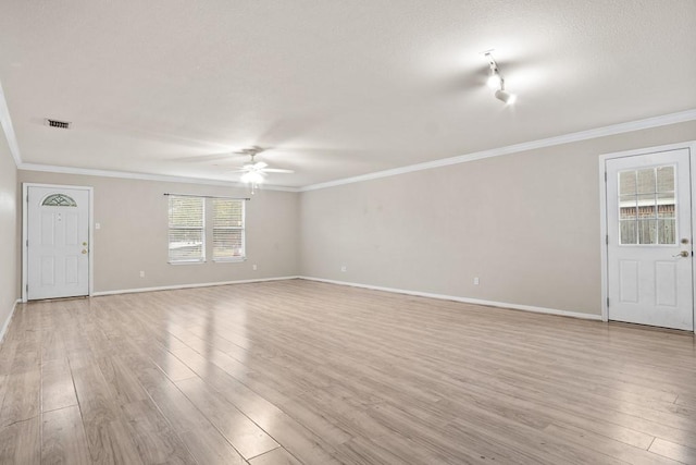 unfurnished living room featuring light wood-type flooring, ceiling fan, and ornamental molding