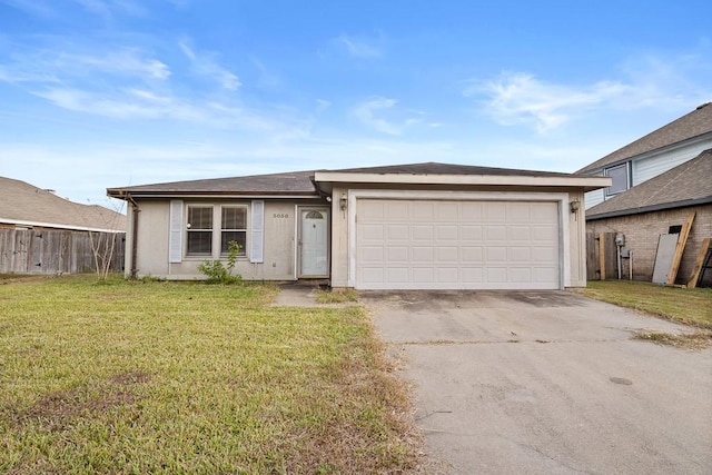 ranch-style house with a garage and a front yard