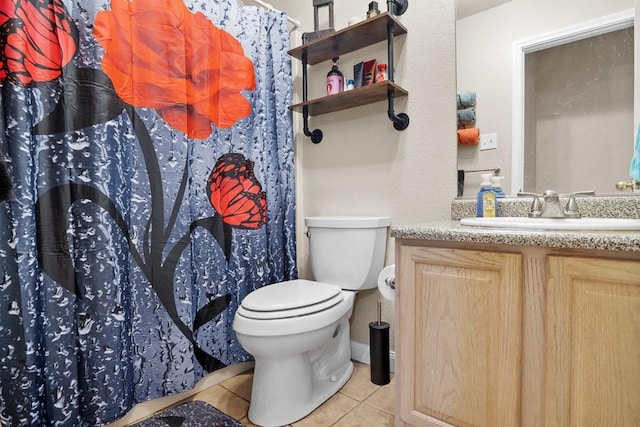 bathroom with toilet, vanity, tile patterned flooring, and a shower with curtain