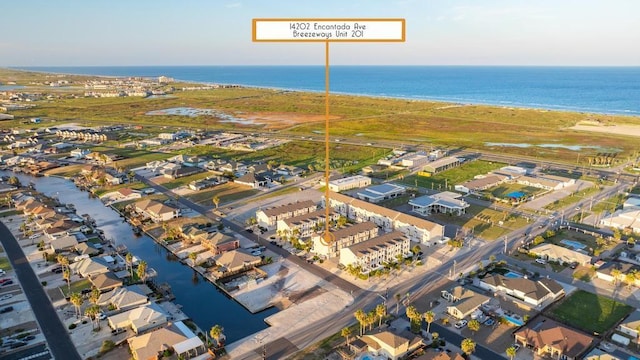 drone / aerial view featuring a water view and a residential view